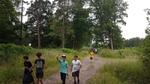 PALS boys clean up litter outside the school and in the forest